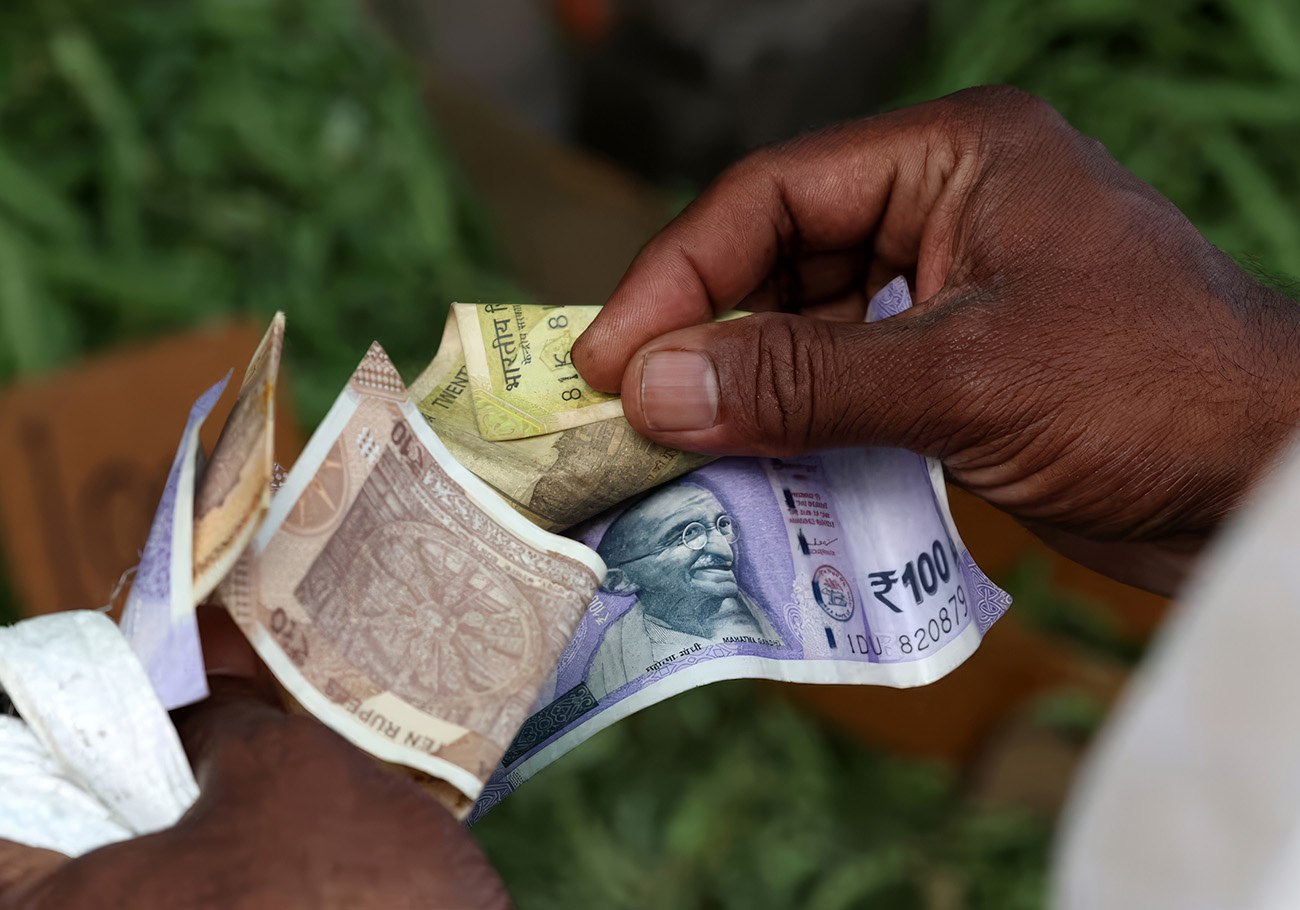 Indian Rupee Plunges to Record Low Amid Oil